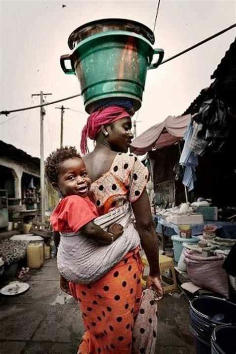 East Africa Mother Carrying Green Bucket On Her Head To Market African People World Cultures