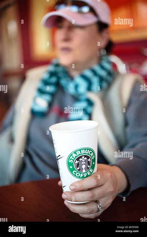 Woman Drinking Coffee Starbucks Hi Res Stock Photography And Images Alamy