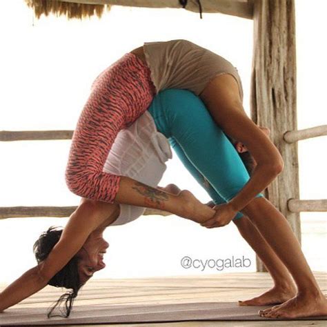 The person who is going to be at the bottom, starts with a regular plank. two person yoga challenge hard - two person yoga challenge