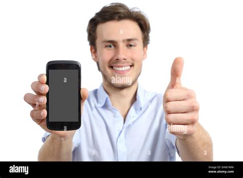 Young Man Showing A Blank Smart Phone Screen With Thumbs Up Isolated On