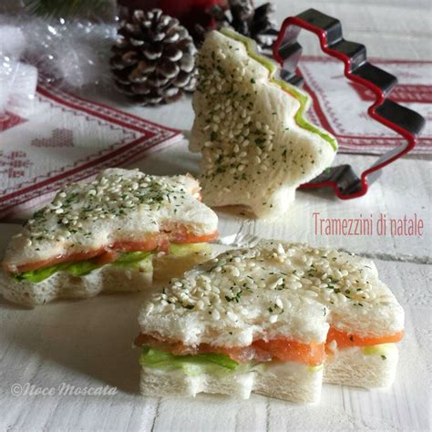 Dolce dalla forma di bignè ma fatto di pan di spagna, con il cuore di panna o di cioccolato, ricoperto di polvere di cacao. Tramezzini di Natale con salmone affumicato