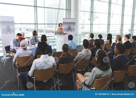 Group Of Business People Attending A Seminar Stock Photo Image Of