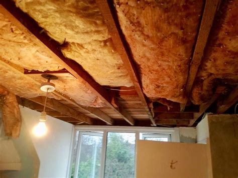 A combination of plaster,timber and hessien are used to make cornice.what you get between the walls. Insulated and boarded ceiling, curved landing ceiling ...