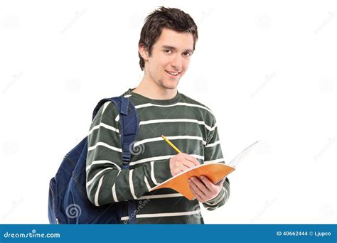 Young Male Student Writing In A Notebook Stock Photo Image Of Smiling