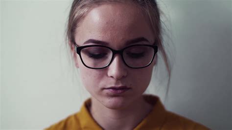 A Front View Portrait Of Young Sad Girl Looking At Camera A Close Up Stock Video Footage 0009