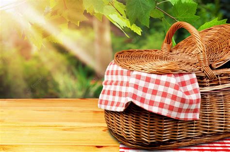 Premium Photo Picnic Basket With Napkin On Nature Background