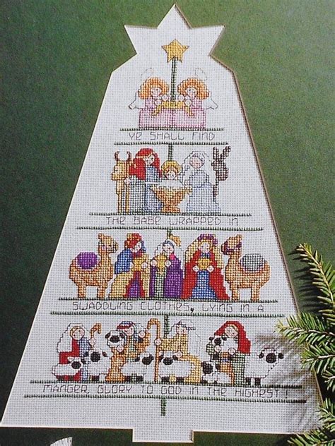 The counted cross stitch technique allows detailed embroidering. Lorraine Birmingham A CHRISTMAS TREE - Counted Cross ...