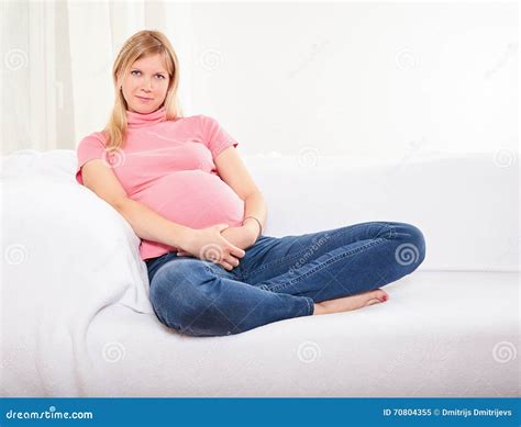 Pregnant Woman Relaxing At Home On The Couch Stock Image Image Of Abdomen Hope 70804355