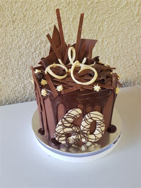 Amazing cake & such care taken with delivery too. Chocolate Drip cake loaded with tempered chocolate ...