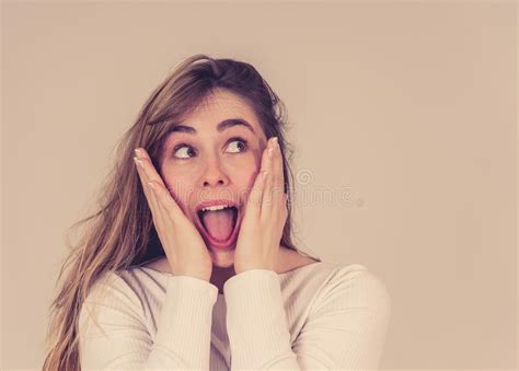Happy Young Attractive Teenager Girl Shocked With Surprised Funny Face Human Expressions Stock