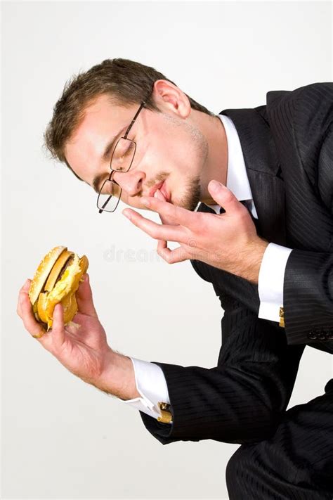 Homme D affaires Mangeant L hamburger Affamé Image stock Image du