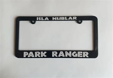 a black license plate frame with the word park ranger on it