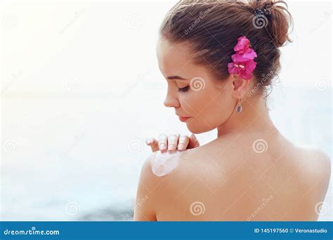 Beauty Woman Applying Sunscreen Creme On Tanned Shoulder Skincare Body Sun Protection Sun