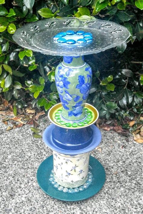 Thrifted Items Upcycled Into Birdbaths Or Garden Decor Glass Garden Art Glassware Garden Art