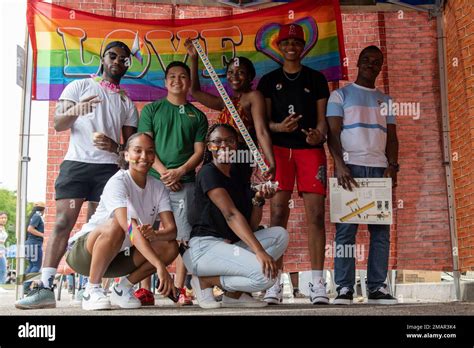Attendees Pose For A Photo At The Cultural Fair Held During Diversity