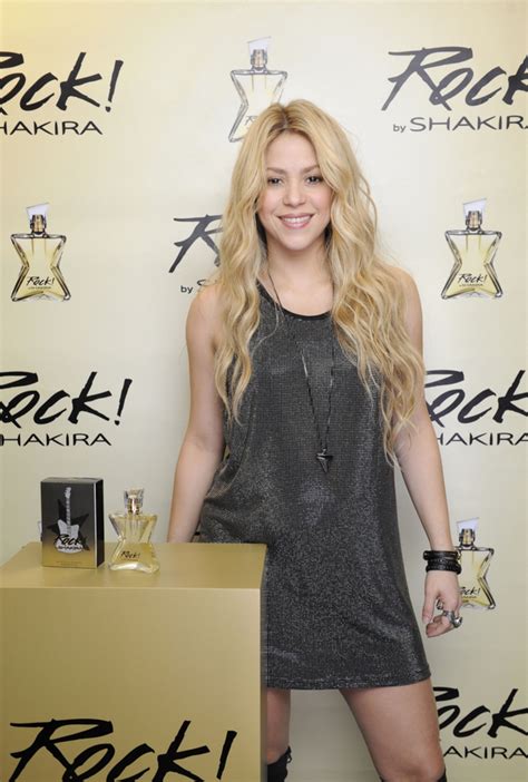 Pregnant Shakira Shows Off Tiny Baby Bump In Silver Mini Dress While