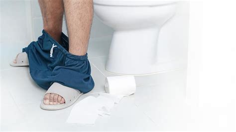 Premium Photo Diarrheaa Man Sitting Up Close On The Toilet Bowl On A White Background
