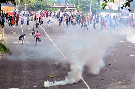 Police Use Tear Gas And Water To Disperse Protesting University