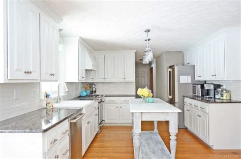 See more ideas about kitchen cabinets before and after, kitchen cabinets, painting kitchen a builder grade kitchen gets a new look featuring gray cabinets, quartz counters and subway tile. DIY White Painted Kitchen Cabinets Reveal