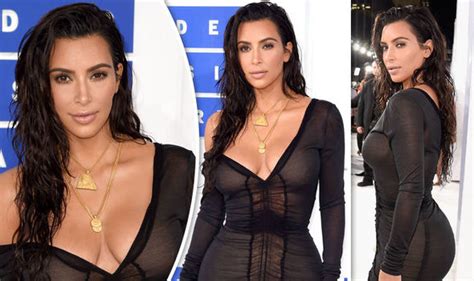 Kim Kardashian Flashes Ample Assets As She Goes Braless In Sheer Mini