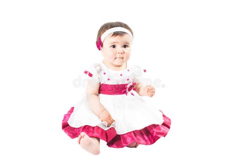 Little Cute Baby Girl In Pink Dress Isolated On White