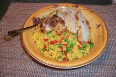 Simmer, covered, until the rice is tender and the water is absorbed, approximately 25 minutes. Cuban Chicken With Yellow Rice Recipe - Food.com