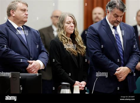 Lori Vallow Daybell stands and listens as the jury's verdict is read at