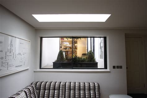 Vinyl frame is 2.25 thick; www.iqglassuk.com Minimal Windows sliding doors used as ...
