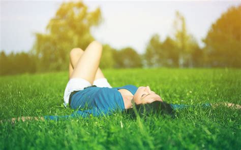 Woman Wearing Blue V Neck Elbow Sleeved Top And White Short Shorts