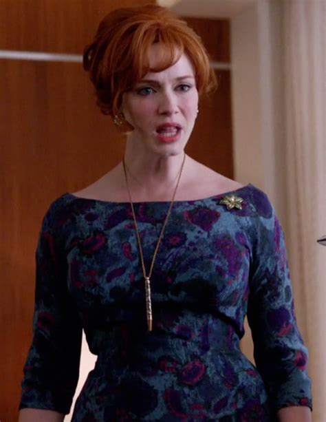 Christina Hendricks Stars As Joan Holloway In Mad Men Wearing A Gorgeous Blue Foral Dress With
