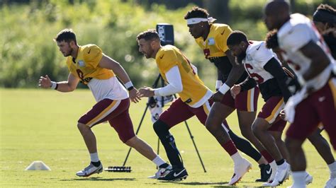 Model in images 1 and 2 is a small model wearing a medium shirt. QB Alex Smith works out with Dwayne Haskins at Washington ...