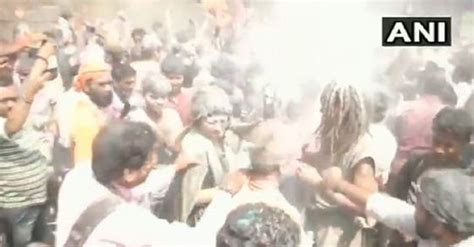 Holi Celebration With Pyre Ashes At Varanasis Manikarnika Ghat Watch