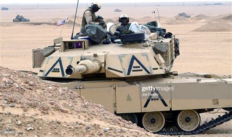 S Army M1a1 Abram Tank Rolls Through The Desert December 18 2002