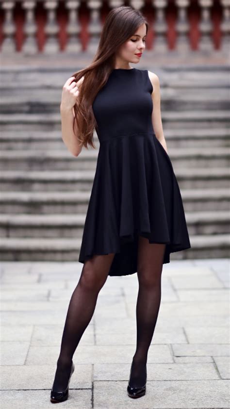 Black Dress With Long Back Black Stockings And Patent Leather Heels