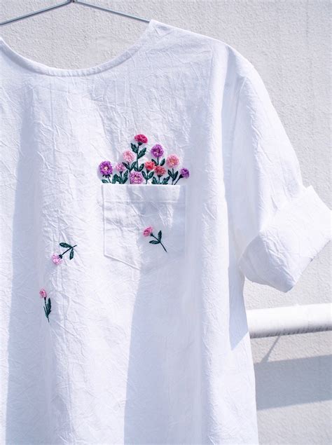 Clever Embroidery Placement Turns Ordinary Clothes Into Wearable Art