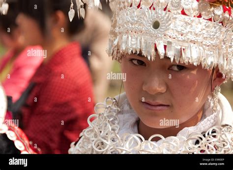 a-miao-girl-with-silver-headdress-and-massive-necklaces,-during-stock