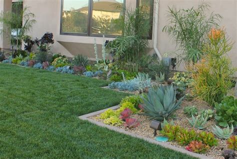 Incorporate a private walkway within your landscape plan and end with a bench to sit and enjoy the. Front yard Succulents