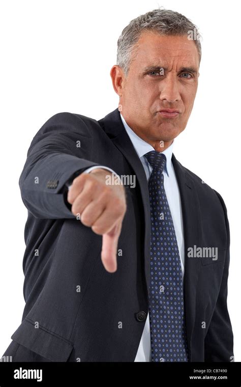 Disapproving Businessman Giving The Thumbs Down Stock Photo Alamy