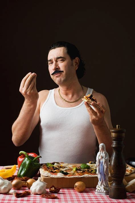 A Stereotypical Italian Man Eating Pizza License Image Image Professionals