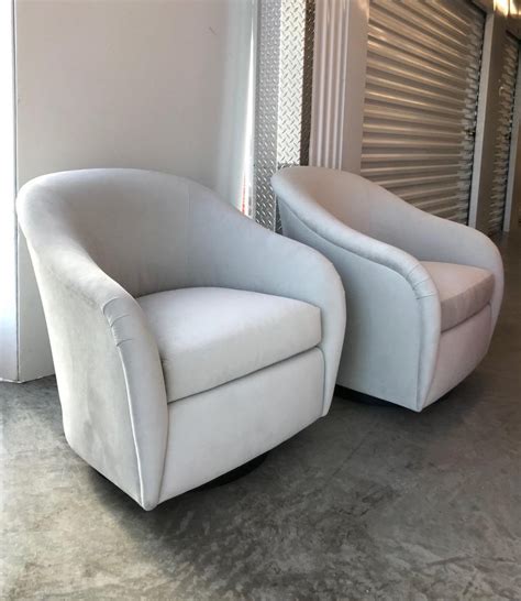 Classic series 7 chairs with a modern finish. Mid-Century Modern Swivel Lounge Chair in Grey Velvet by ...