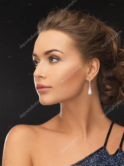 Woman With Diamond Earrings — Stock Photo © Sydaproductions 25108005