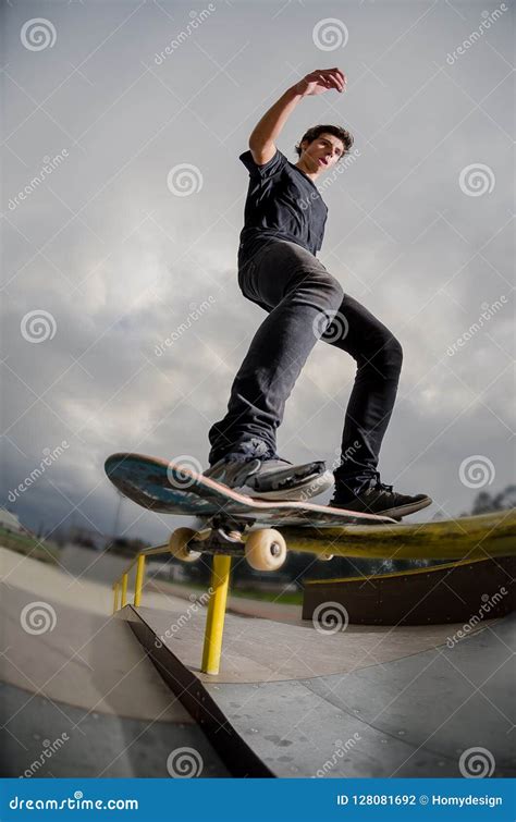 Skateboarder Doing A Board Slide Stock Photo Image Of Keywords