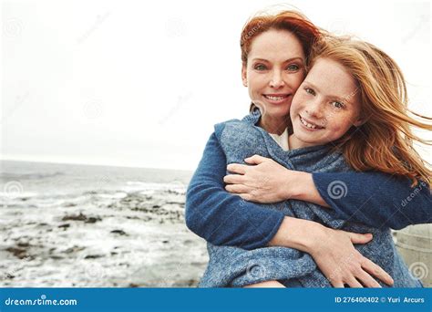 Shes My Mother And My Best Friend A Mature Woman Embracing Her Young Daughter At The Waterfront