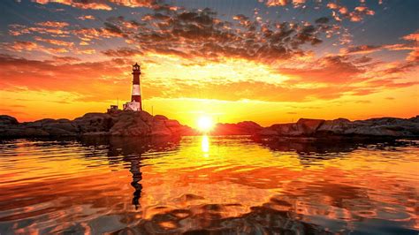 Lighthouse At Sunset Hd Wallpaper Background Image 1920x1080