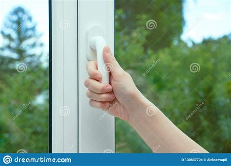 A Woman Hand Opens The Sash Of The Window. Stock Photo - Image of room, opens: 130837704
