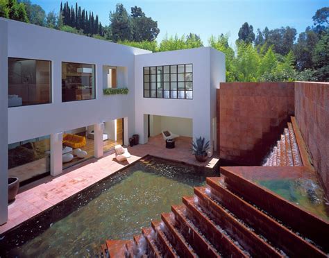 Holmby Hills Adobe Reflects Iconic Fountain By Mexican Architect Luis