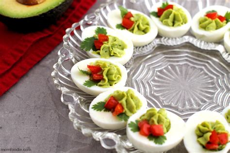 Appetizers for christmas parties and dinners. Christmas Deviled Eggs - 24/7 Moms