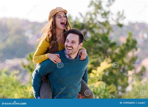 Young Beautiful Cheerfull Romantic Couple Having Fun Outdoors Stock