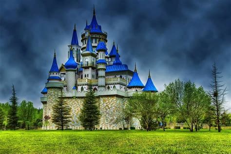 Castle With Blue Roofs Download Hd Wallpapers And Free Images