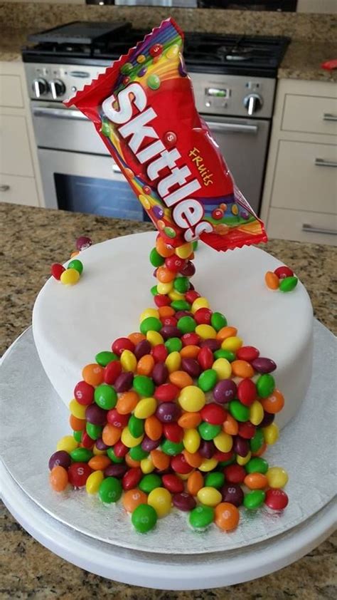 Gravity Defying Skittles Cake Vanilla Sponge Covered With Basic Fondant And A Load Of Skittles